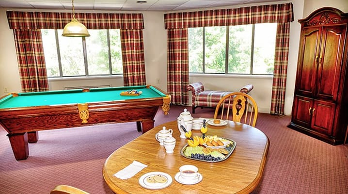 Cozy common area with a pool table and refreshments