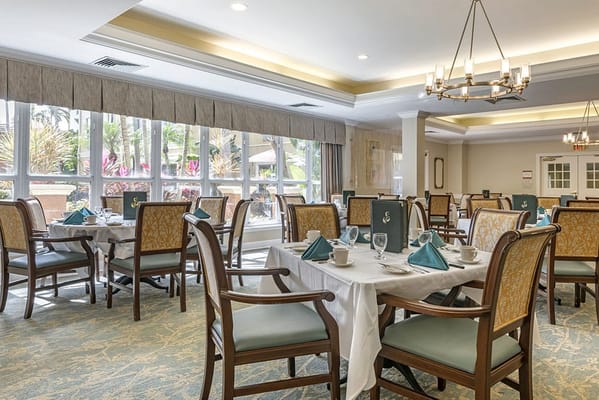 Elegant dining room setup with tables and chairs