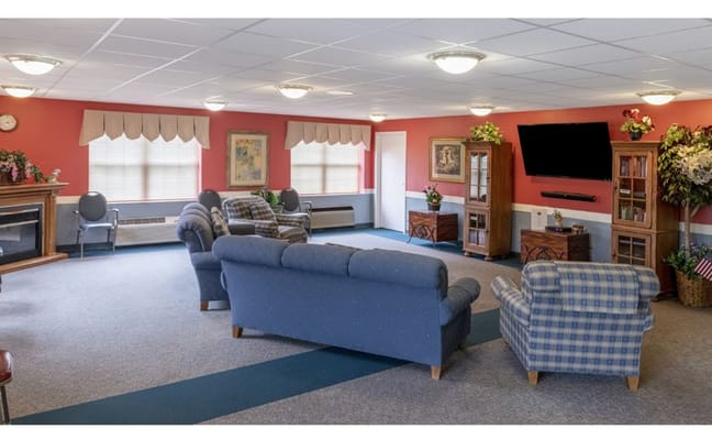 Bright common area with seating and decor