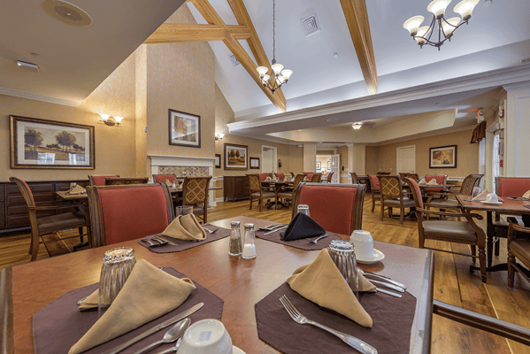 Interior view of a dining area with neatly set tables