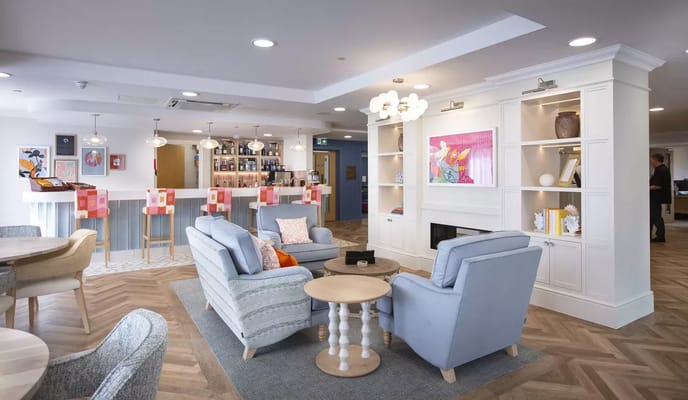 Well-furnished common area with cozy seating