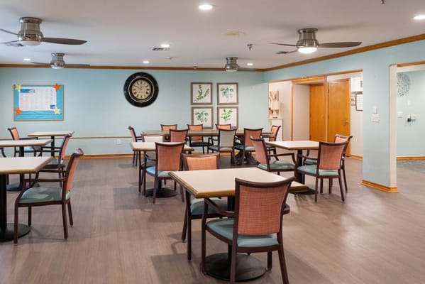 Interior dining area with tables and chairs