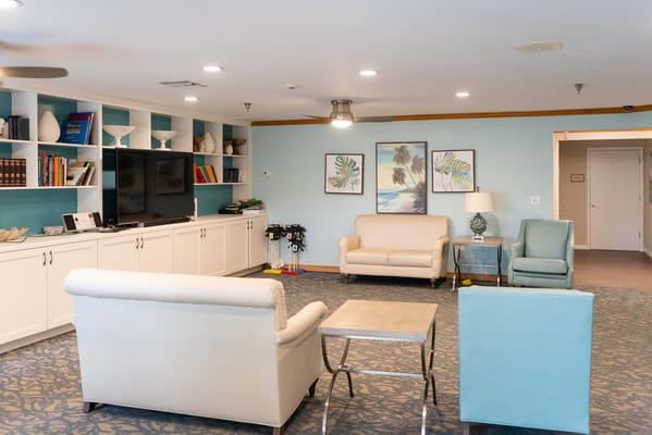 Bright common area with seating and decor