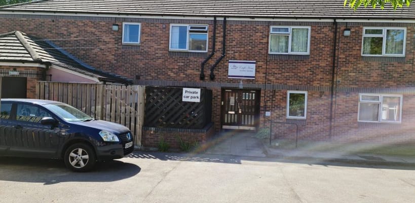 Exterior view of Eagle House with parking space