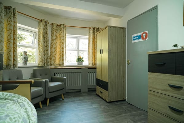 Cozy interior room with chairs and window