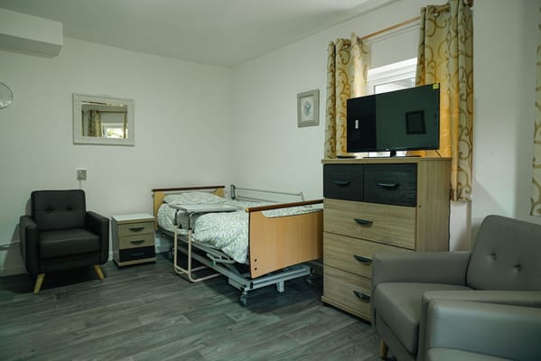 Cozy interior of a resident room with furniture