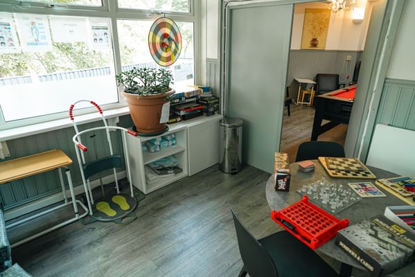 Activity room with games and seating for residents