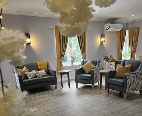 Cozy common area with seating and natural light