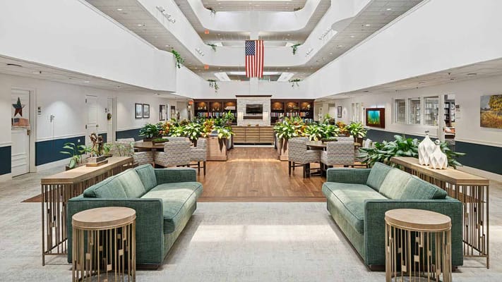 Bright common area with seating and plants