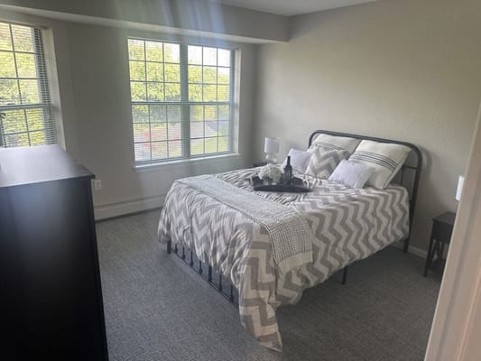 Cozy private room with a bed and window light