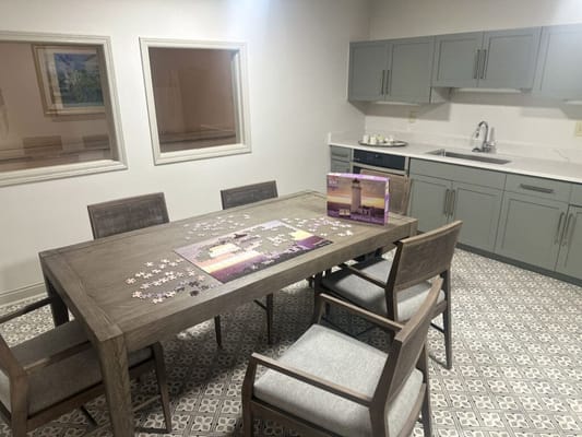 Bright common area with a puzzle on the table