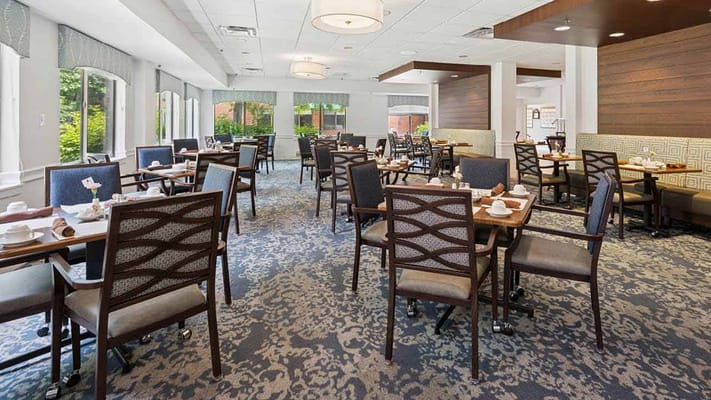 Dining area with tables set for meals