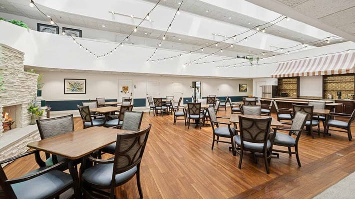Bright dining area with tables and chairs