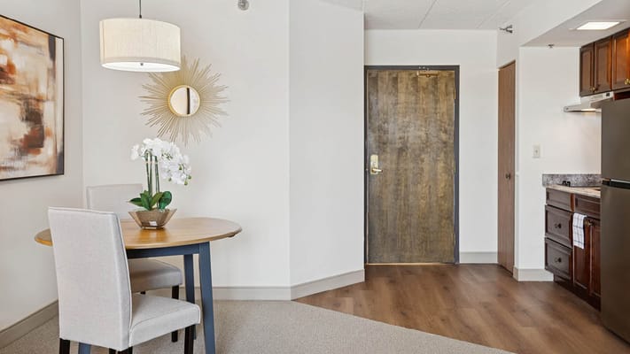 Cozy living room setup in a resident's suite