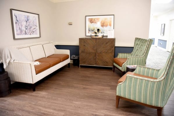 Cozy common area with seating and art