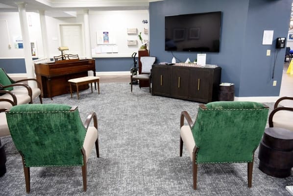 Common area with seating and a piano