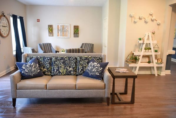 A cozy common area with seating and decor