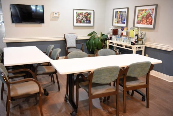 Interior common area with tables and chairs