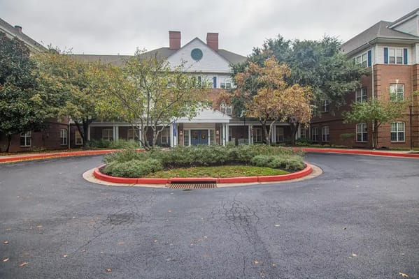 Exterior view of the facility entrance with landscaping