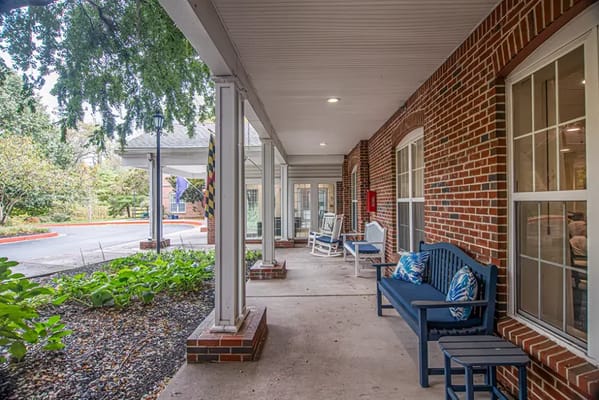 Porch area with seating at a senior living facility