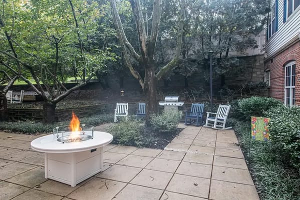 Outdoor space with seating and fire pit