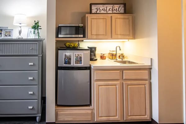 Cozy kitchenette setup in a resident unit
