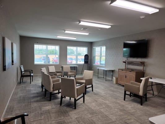 Common area with seating and television