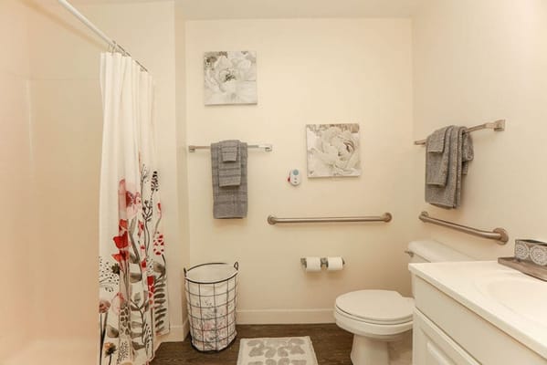 Well-decorated bathroom in a senior living facility