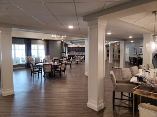 Interior of a common area with dining tables and seating