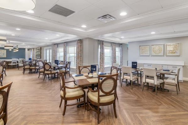 Bright dining room with tables and chairs