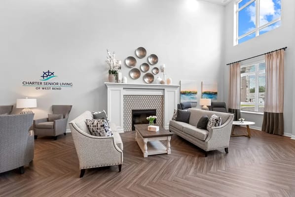 A cozy common area with comfortable seating and decor