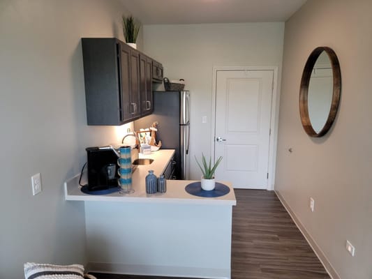 Bright kitchen area in a modern resident room