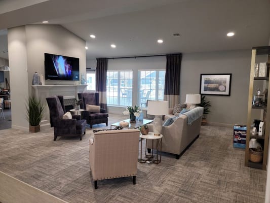 Comfortable common area with plush seating and decor