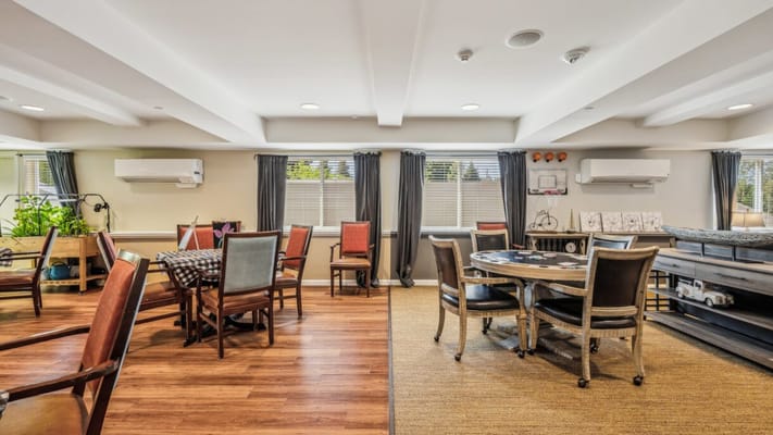 Interior view of a common area with seating and tables