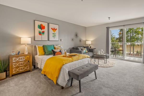 A bright interior of a resident room with decor