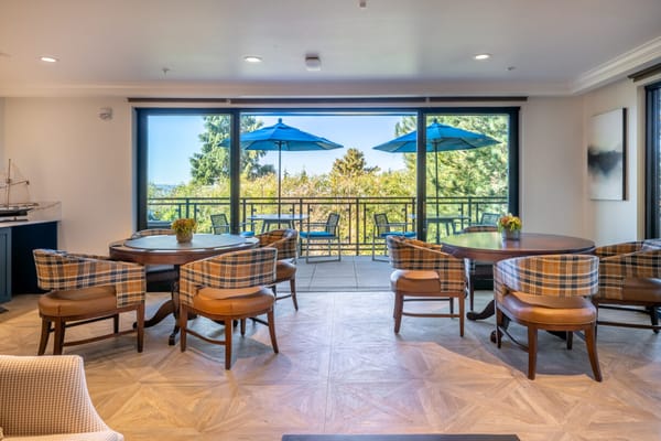 Bright and inviting common area with outdoor views