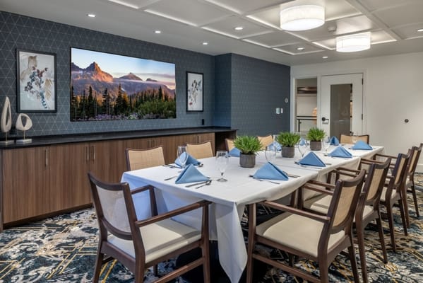 Elegant dining area set for a meal with decor