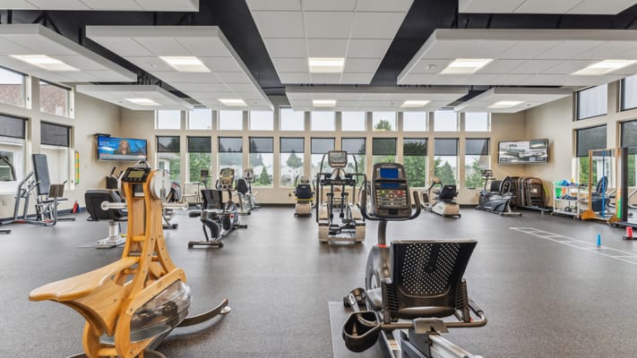 Interior view of a fitness center with exercise equipment