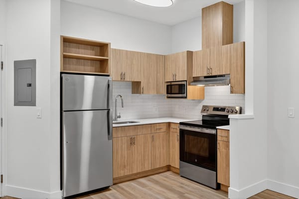 Modern kitchen area in a resident's unit