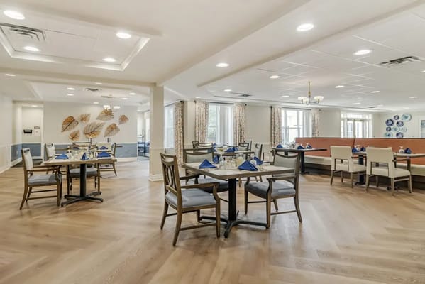 Bright dining room with neatly set tables