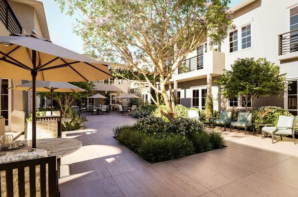 Outdoor space with seating and greenery in the facility
