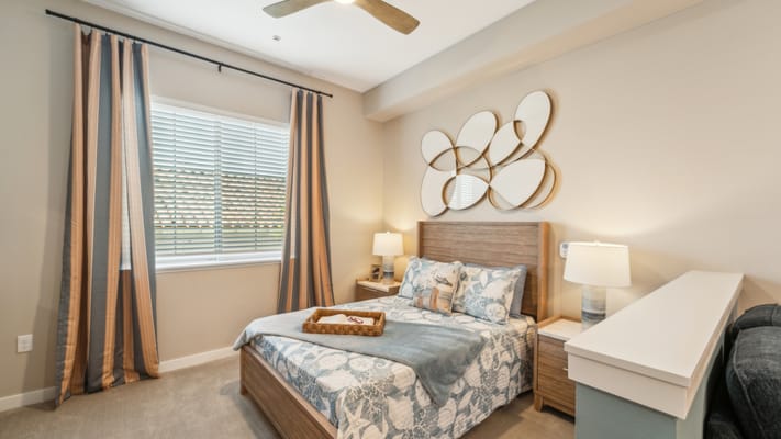 Cozy bedroom with natural light and decor