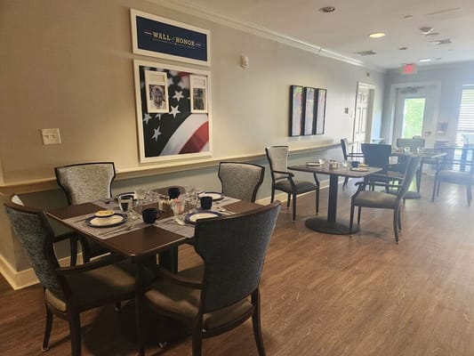 Interior dining area with tables set for a meal