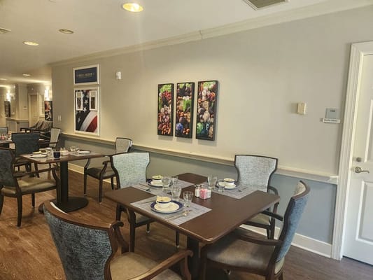 Dining area with tables set for meals