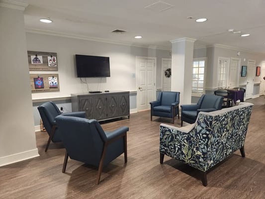 Common area with seating in a senior living facility
