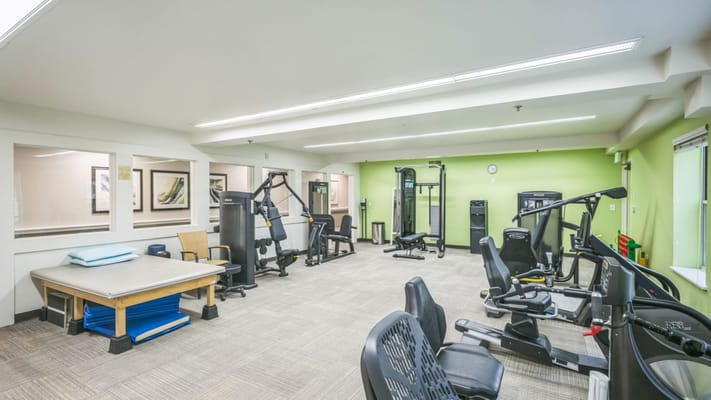 Interior view of a fitness room with exercise equipment