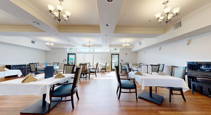Dining area with elegant table settings and decor