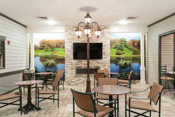 Common area with seating and nature-themed decor
