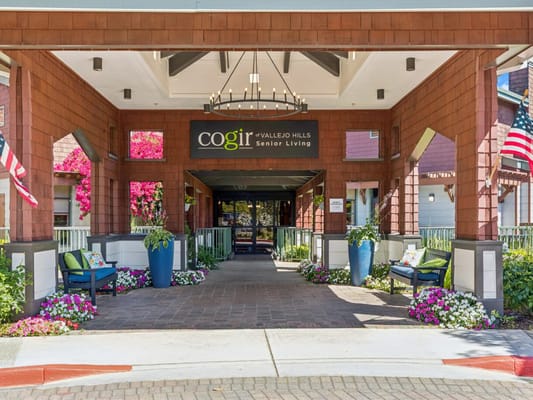 Entrance of Cogir of Vallejo Hills with floral decor
