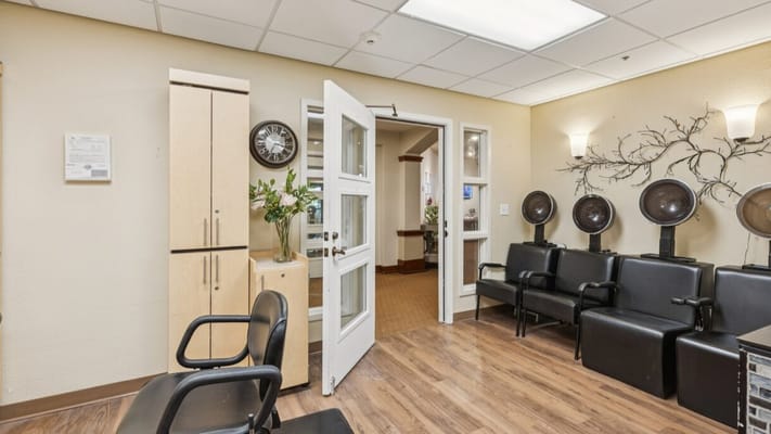 Interior view of a salon area with chairs